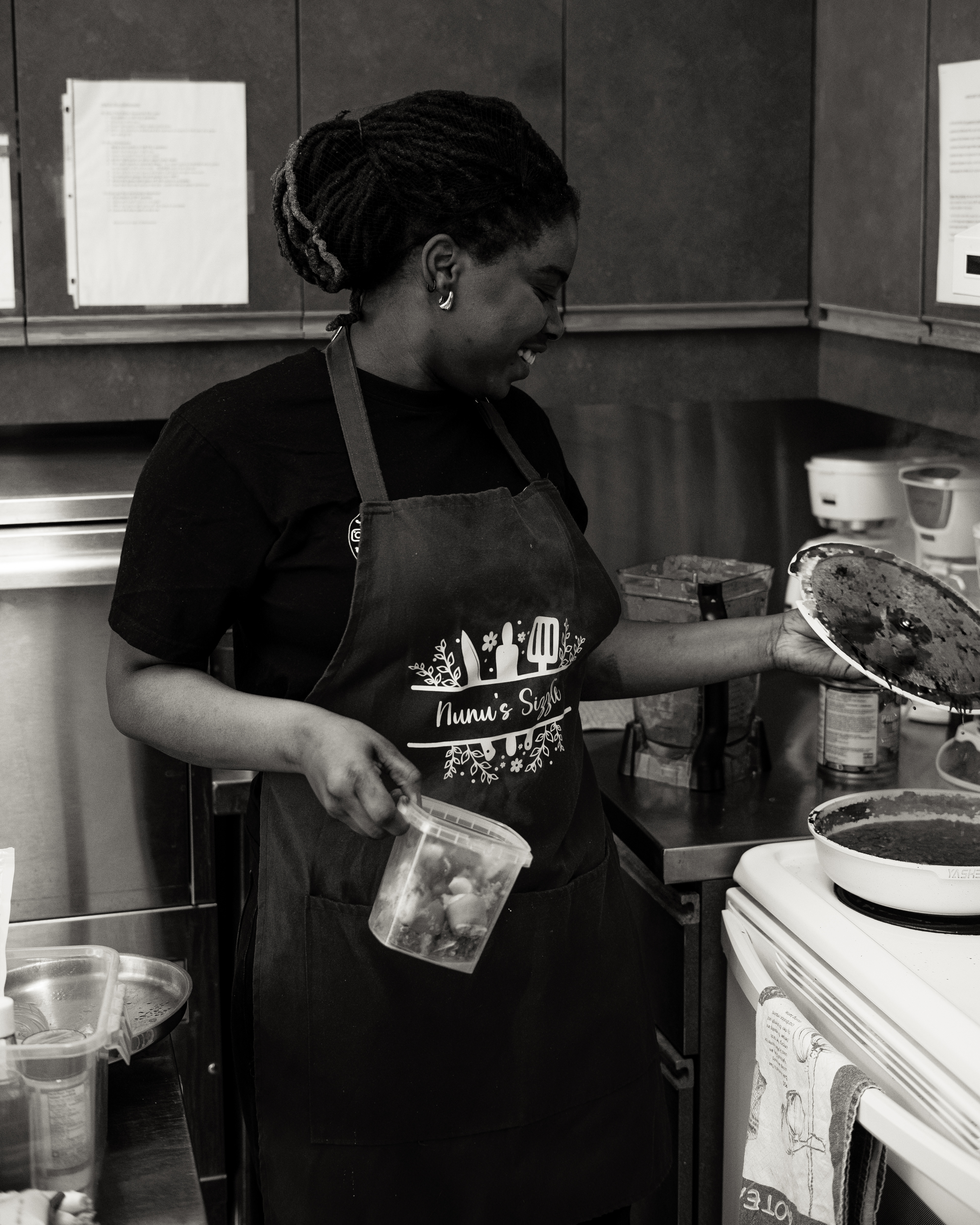 Chef Nunu cooking in the kitchen